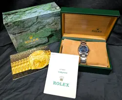 Rolex 67480 Oyster Perpetual Blue Dial 31mm 1997 Box & Papers
