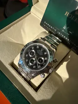 ROLEX COSMOGRAPH DAYTONA 116519 SILVER AND WHITE GOLD BAND
