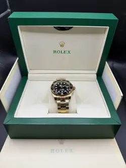 ROLEX DATEJUST SUBMARINER BLACK AND GOLD 126618