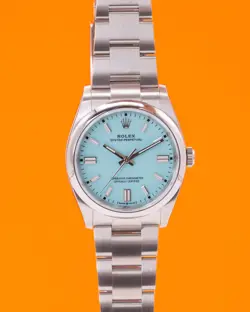 UNWORN STICKERED ROLEX