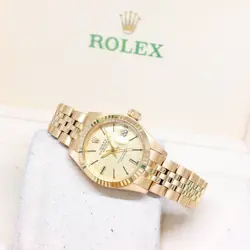 ROLEX 26MM OYSTER PERPETUAL 18K YELLOW GOLD CHAMPAGNE LINEN DIAL DATE REF: 6917
