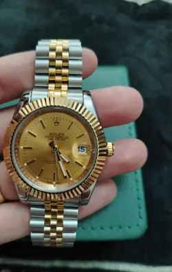 ROLEX OYSTER PERPETUAL 1005 GOLD OYSTER BRACELET WITH GOLD BEZEL
