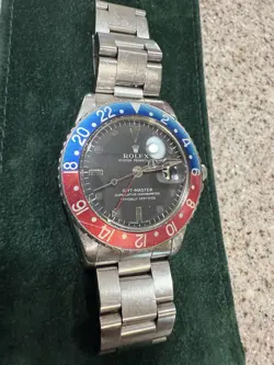 ROLEX PEPSI GMT-MASTER 1675 SILVER OYSTER BRACELET WITH BLUE AND RED BEZEL