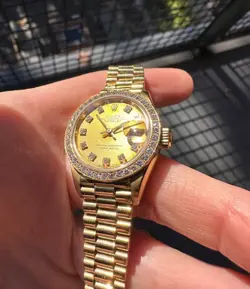 Rolex Lady-Datejust 69138 Gold President Bracelet with Gold and White Bezel