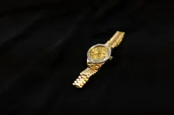 Rolex Lady-Datejust 69138 Gold President Bracelet with Gold and White Bezel