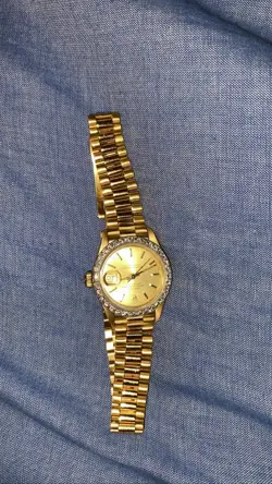 WITH GOLD AND