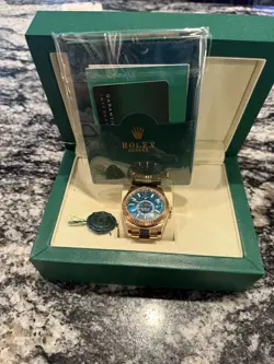 ROLEX SKY DWELLER ROSE GOLD BLUE DIAL