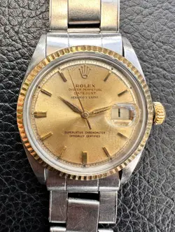 ROLEX DATEJUST 1601 SERPICO & LAINO DIAL, OYSTER RIVETED BRACELET, GOLD BEZEL
