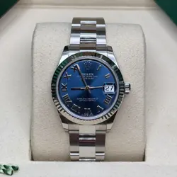 ROLEX DATEJUST 31 NEW 2025 BLUE ROMAN DIAL STAINLESS STEEL FLUTED BEZEL OYSTER