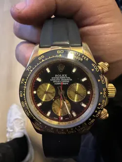 ROLEX AA1818 BLACK AND GOLD