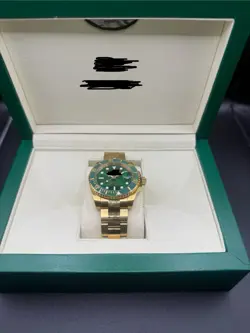 ROLEX DATEJUST SUBMARINERGOLD AND GREEN 36MM CL 722260
