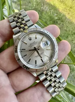 ROLEX DATEJUST TURN-O-GRAPH 36MM SUNBURST SILVER DIAL STAINLESS STEEL JUBILEE