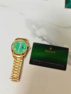 WATCH ROLEX OYSTER PERPETUAL DAY-DATE (GOLD AND GREEN) COMES WITH BOX AND RECIPT