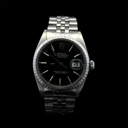 ROLEX DATEJUST 1603 – 36MM STAINLESS STEEL WITH BLACK DIAL & ENGINE-TURNED BEZEL