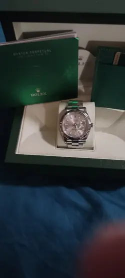 ROLEX DATEJUST, GOLD BEZEL, STAINLESS STEEL BRACELET,  SILVER SUNBURST DIAL