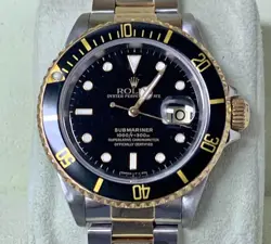 ROLEX SUBMARINER 16613 SILVER AND GOLD OYSTER  WITH BLACK DIAL