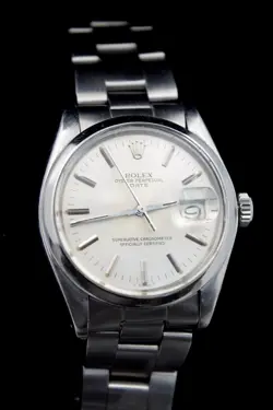 ROLEX MENS DATE SUPERLATIVE CHRONOMETER STAINLESS 1500  35MM (BTS1000)
