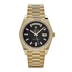 ROLEX DAY-DATE 40 228398TBR YELLOW GOLD ONYX BAGUETTE DIAMOND DIAL BAGUETTE