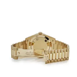 Rolex Day-Date 40 228398TBR Yellow Gold Onyx Baguette Diamond Dial Baguette