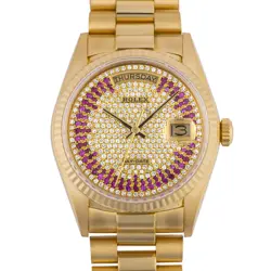 WITH DIAMOND/RUBY BEZEL