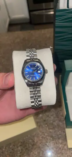 ROLEX SILVER OYSTER PERPETUAL DATEJUST BLUE DIAL STAINLESS STEEL WATCH