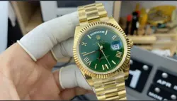 GOLD ROLEX DAY-DATE GREEN DIAL