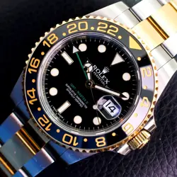 ROLEX GMT-MASTER II 116713LN SILVER AND GOLD OYSTER BRACELET WITH BLACK BEZEL