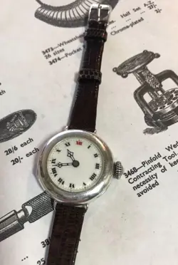 SILVER ROLEX WRIST