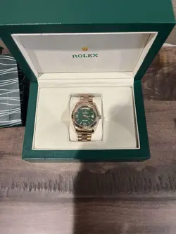 ROLEX STAINLESS STEEL GREEN DIAL