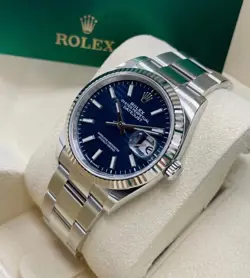 MENS ROLEX DATE-JUST CL0NE. IN BOX WITH PAPERS AND RECEIPT.