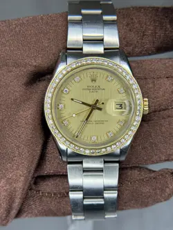 ROLEX DATE 34MM. AM DIAMOND BEZEL