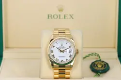 ROLEX DAY-DATE 40MM YELLOW GOLD PRESIDENT, WHITE ROMAN DIAL, FLUTED BEZEL 228238