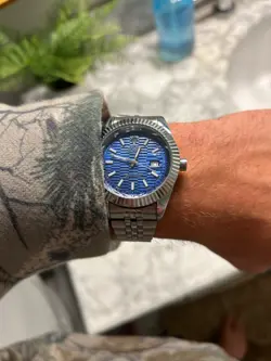 USED ROLEX WATCH.