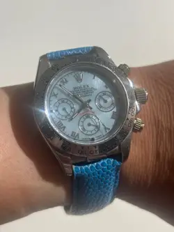 ROLEX OYSTER PERPETUAL SUPERLATIVE CHRONOMETER OFFICIALLY CERTIFIED COSMOGRAPH