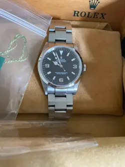 ROLEX EXPLORER 114270 WITH ORIGINAL BOX AND PAPERS
