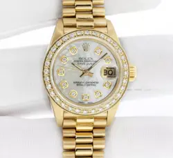 DIAMOND BEZEL WATCH..