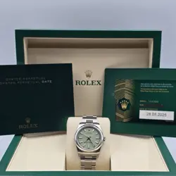 NEW ROLEX OYSTER PERPETUAL GREEN DIAL 