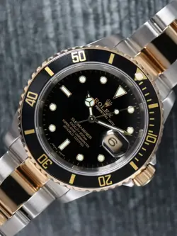 40825: ROLEX SUBMARINER 40, REF. 16613LN, CIRCA 2001. 2025 FACTORY SERVICE CARD