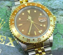 ROLEX GMT-MASTER II 16713 TWO-TONE YELLOW GOLD AND STEEL ROOTBEER JUBILEE