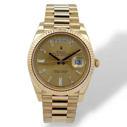ROLEX DAY-DATE 228238 CHAMPAGNED DIAMOND DIAL, YELLOW GOLD PRESIDENT BRACELET.