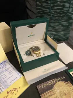 ROLEX - THE OYSTER PERPETUAL SUBMARINER