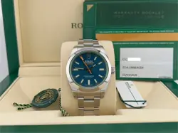 Rolex Milgauss 116400GV Blue Dial Green Crystal Stainless Steel 40mm Box Papers