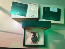 Rolex Milgauss 116400GV Blue Dial Green Crystal Stainless Steel 40mm Box Papers