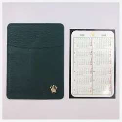 ROLEX CALENDAR 1986 W/ CARD CASE