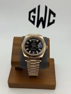 ROLEX DAY-DATE II 41MM 218235 BLACK DIAMOND AND RUBY DIAL ROSE GOLD BAND