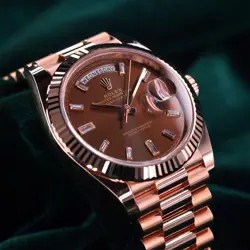 ROLEX DAY-DATE 40 BROWN BAGUETTE PRESIDENTIAL ROSE GOLD MINT FULL SET 228235