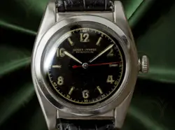 ROLEX BUBBLE BACK REF.2940 BLACK MIRROR GOLD LETTERS ARABIC DIAL 32MM DATE MEN'S