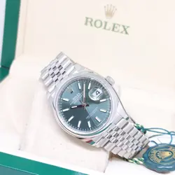 ROLEX 36MM OYSTER PERPETUAL MINT GREEN BATONS DIAL DATEJUST REF: 126200 (2024)