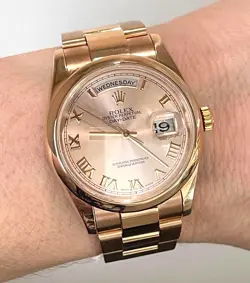 ROLEX DAY-DATE 36  ROSE GOLD ROMAN DIAL REF. 118205