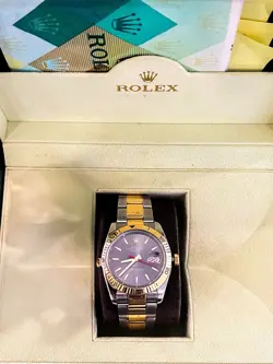 ROLEX OYSTER PERPETUAL DATEJUST MEN'S BLACK DIAL WATCH WITH PAPERS AND BOX.